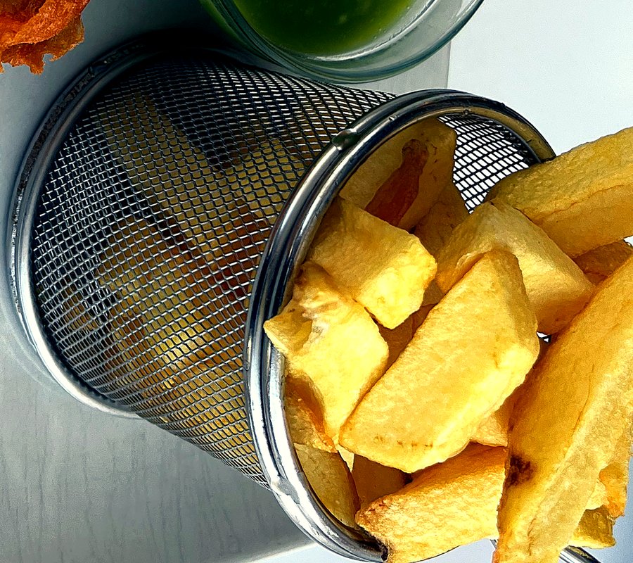 Chunky fresh-cut chips in a serving basket